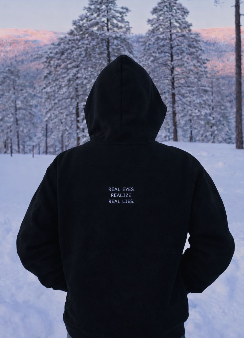 Hanorac “REAL EYES REALIZE REAL LIES”